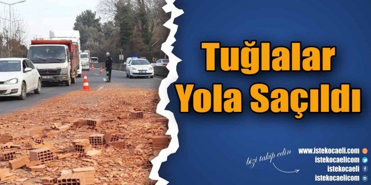 Kocaeli’nin Gölcük ilçesinde virajda TIR’ın kasasında bulunan tuğlalar yola saçılırken,