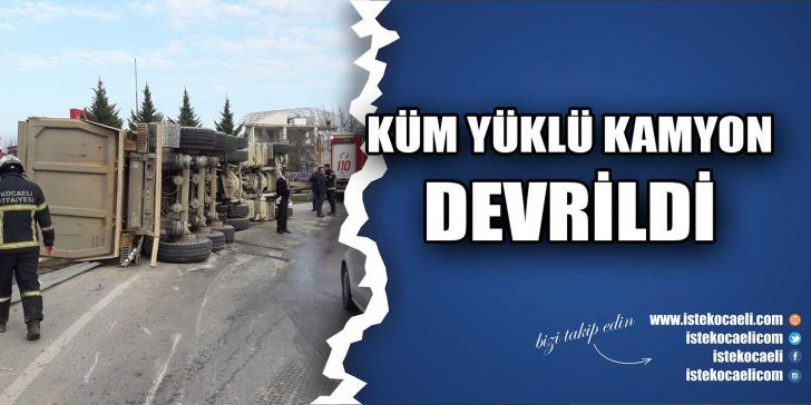 İzmit D-100 karayolunda viraja süratli giren kum yüklü kamyonun devrilmesi