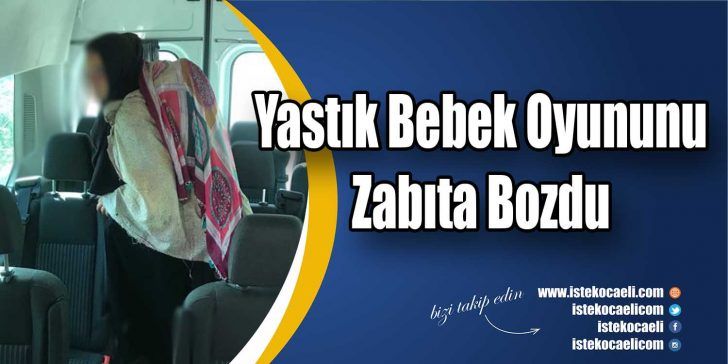 Kocaeli’nin Gebze ilçesinde sırtına astığı yastığa bebek görüntüsü vererek dilenip