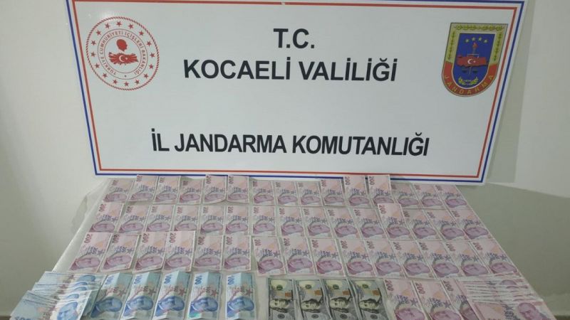 Kocaeli'de piyasaya sahte para sürmeye çalıştığı iddia edilen 9 zanlı